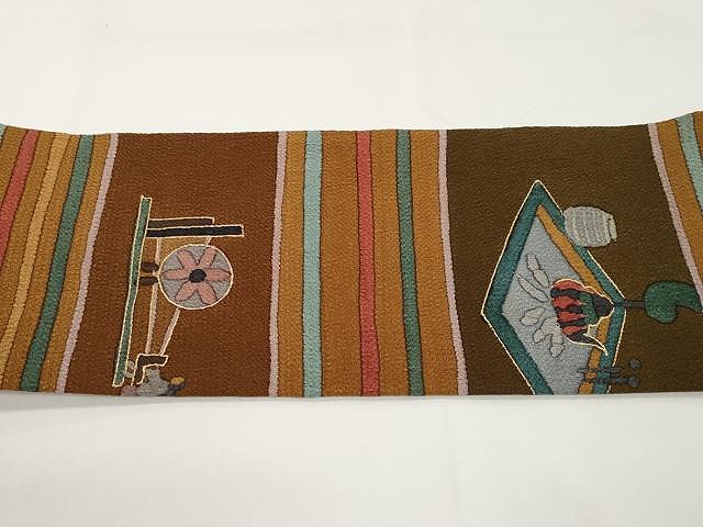 平和屋着物○全通柄九寸名古屋帯 人物風車文 金彩 鬼