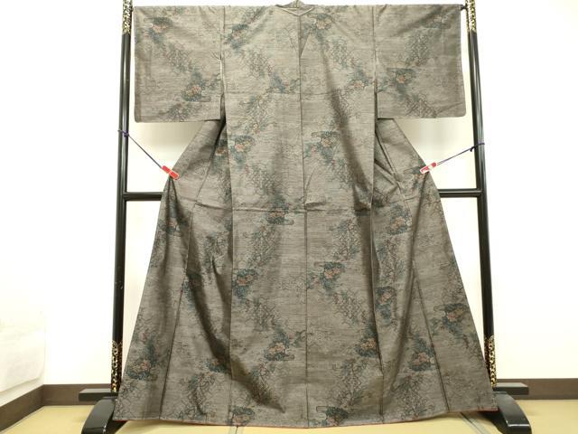 平和屋着物○本場大島紬 古代染色純泥染 亀甲草花文 大野織物