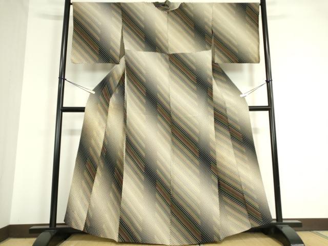 正絹　上質な小紋　袷　東海道柄 楽天市場】【新古品】 小紋 着物 正絹 袷 黒 × 高麗納戸色