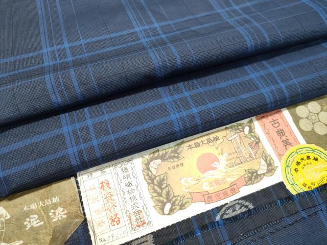 平和屋着物●本場大島紬　泥染め　車輪梅格子　藤絹織物謹製　証紙付き　ロング丈　正絹　逸品　未使用　DAAU0600tw