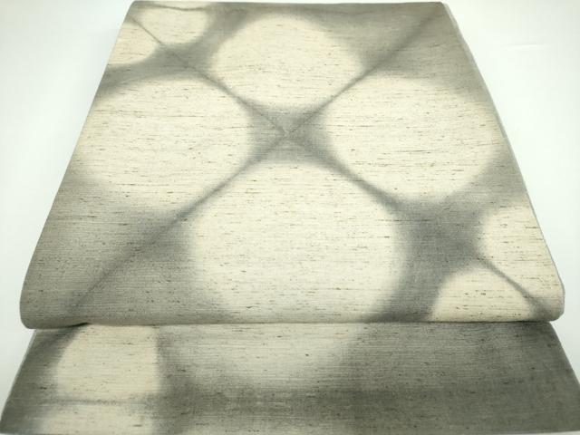 平和屋着物●両面　全通柄袋帯　ぜんまい紬　格子丸文　正絹　逸品　未使用　DAAV6794ps