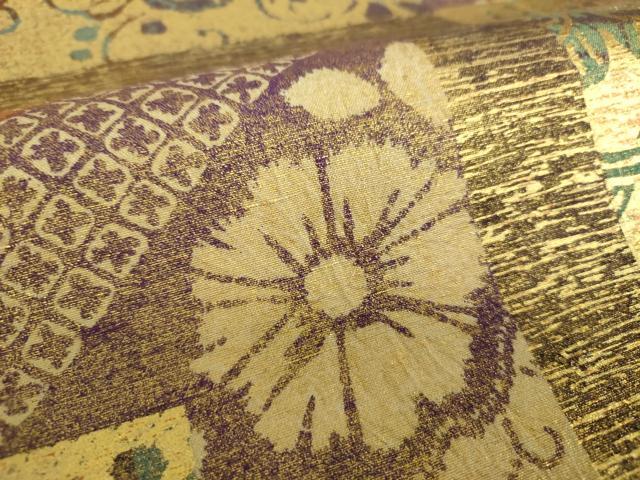 平和屋着物○六通柄袋帯 紬地 絞り 切嵌花文 金彩