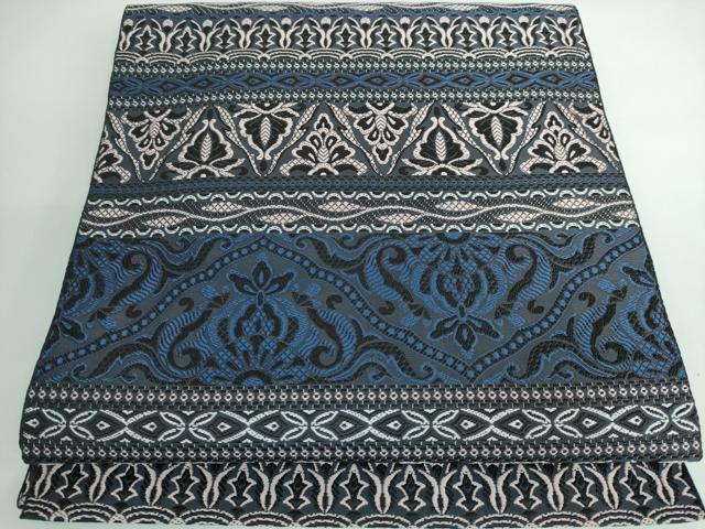 値下げしました。受賞柄唐花紗博多①グレーベース 美品長尺 角帯：本場筑前博多織 胡王唐草文様 透刻唐花文