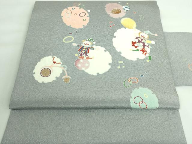 平和屋本店■極上　九寸名古屋帯　雪輪にピエロ　サーカス　鬼しぼ縮緬　灰色地　逸品　DZAA6280kh5