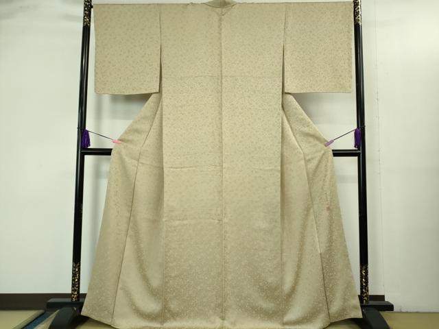 平和屋着物○極上 色無地 山吹花木染 お召地 草花地紋 練色