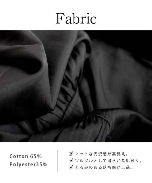 遊び心溢れる大人のデザイン。変形ドレープチュニックブラウス