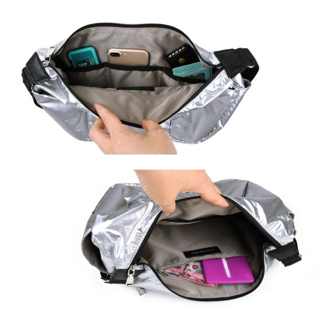 メインポケット B5サイズの書類が入ります。内側にはオープンポケットが4箇所とファスナーポケットが1箇所。そしてボトルホルダーが1箇所。ポケットが多めで細々とした小物類を仕分けて収納するのに便利です。