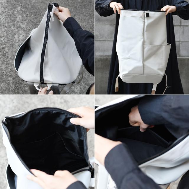 メインポケットはファスナー開閉で、メタル調のビスロンファスナーがモードな雰囲気を演出しています。