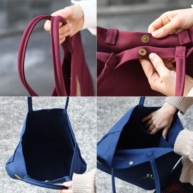 持ち手は芯入りで手が痛くなりにくい仕様です。マグネットボタンによる開閉となります。外側背面にはWWWBAGのロゴの刻印されたレザーパッチが貼り付けられております。