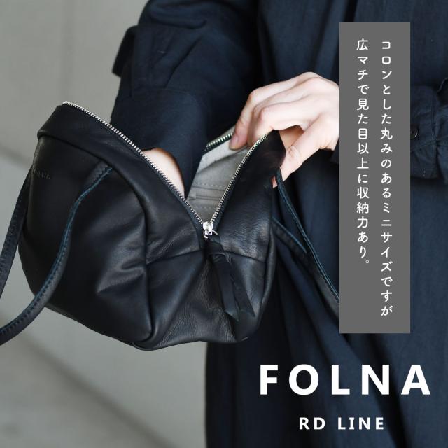 コロンとした丸みのあるミニサイズですが広マチで見た目以上に収納力あり。