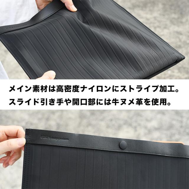 メイン素材は高密度ナイロンにストライプ加工。スライド引き手や開口部には牛ヌメ革を使用。