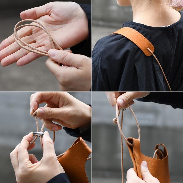 ショルダーベルトはレザーの丸紐ですっきりとしてクールな印象です。