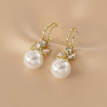 ピアス 揺れる パールリボンピアス 送料無料 即日発送-1